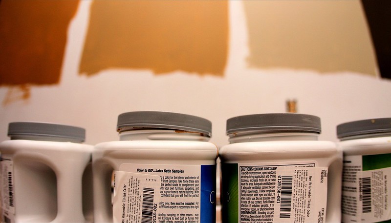 line of paint cans
